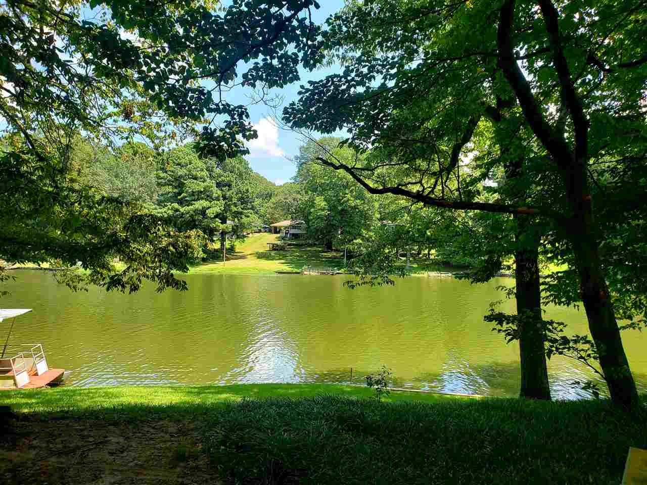 4764 Coro Road Memphis, TN 38109 - Photo 8 of 17 a view of a lake from a yard