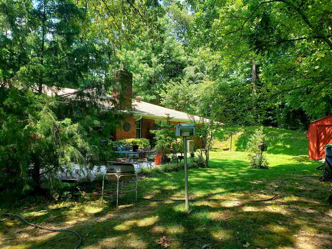 4764 Coro Road Memphis, TN 38109 - Photo 9 of 17 a backyard of a house with lots of green space