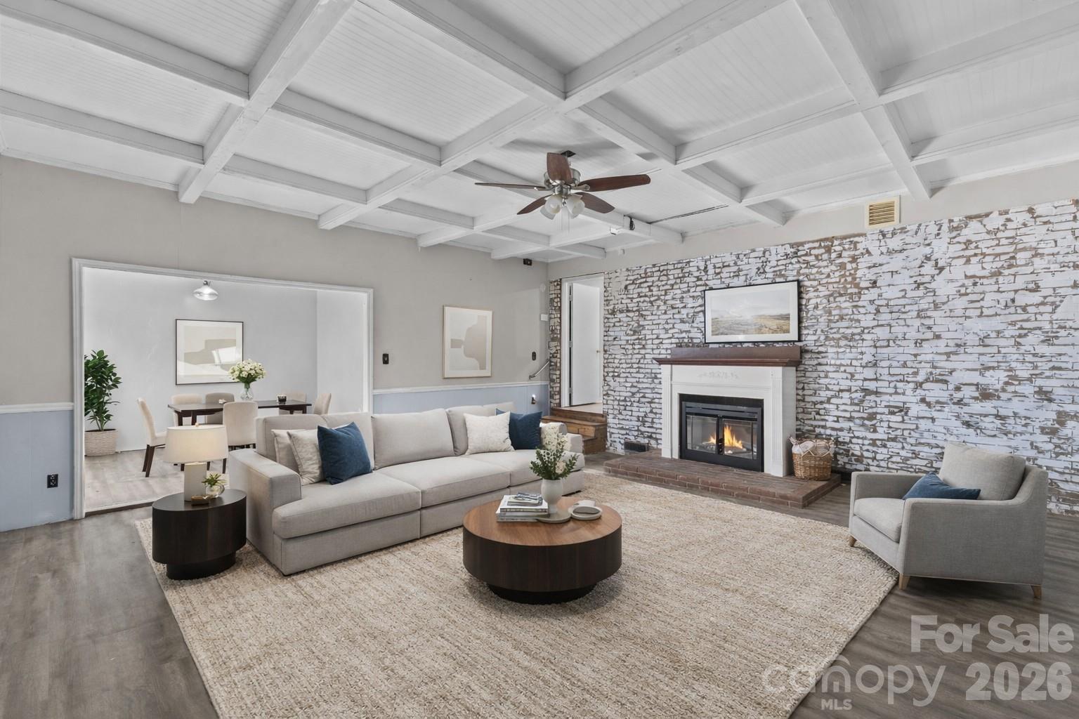 117 Robinson Avenue Matthews, NC 28104 - Photo 1 of 42 a living room with furniture and a fireplace