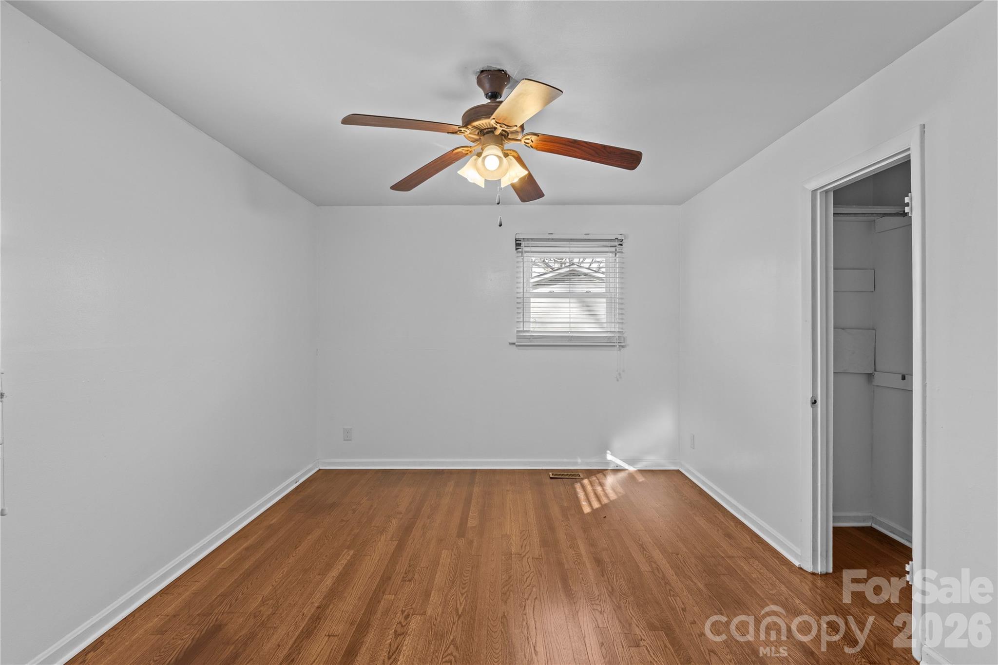 117 Robinson Avenue Matthews, NC 28104 - Photo 13 of 42 a view of room with wooden floor