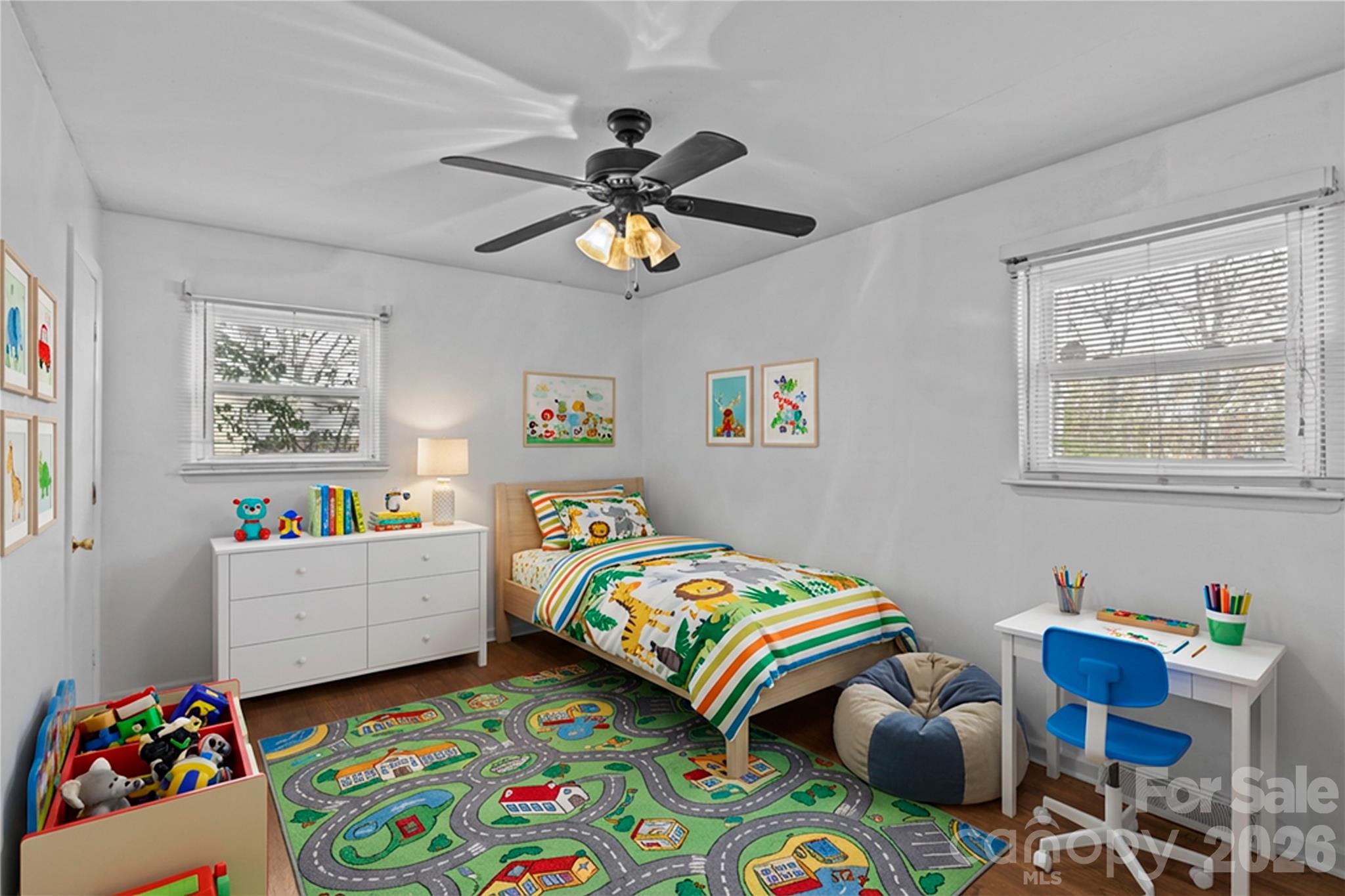 117 Robinson Avenue Matthews, NC 28104 - Photo 18 of 42 a bedroom that has a bed and a baby bed