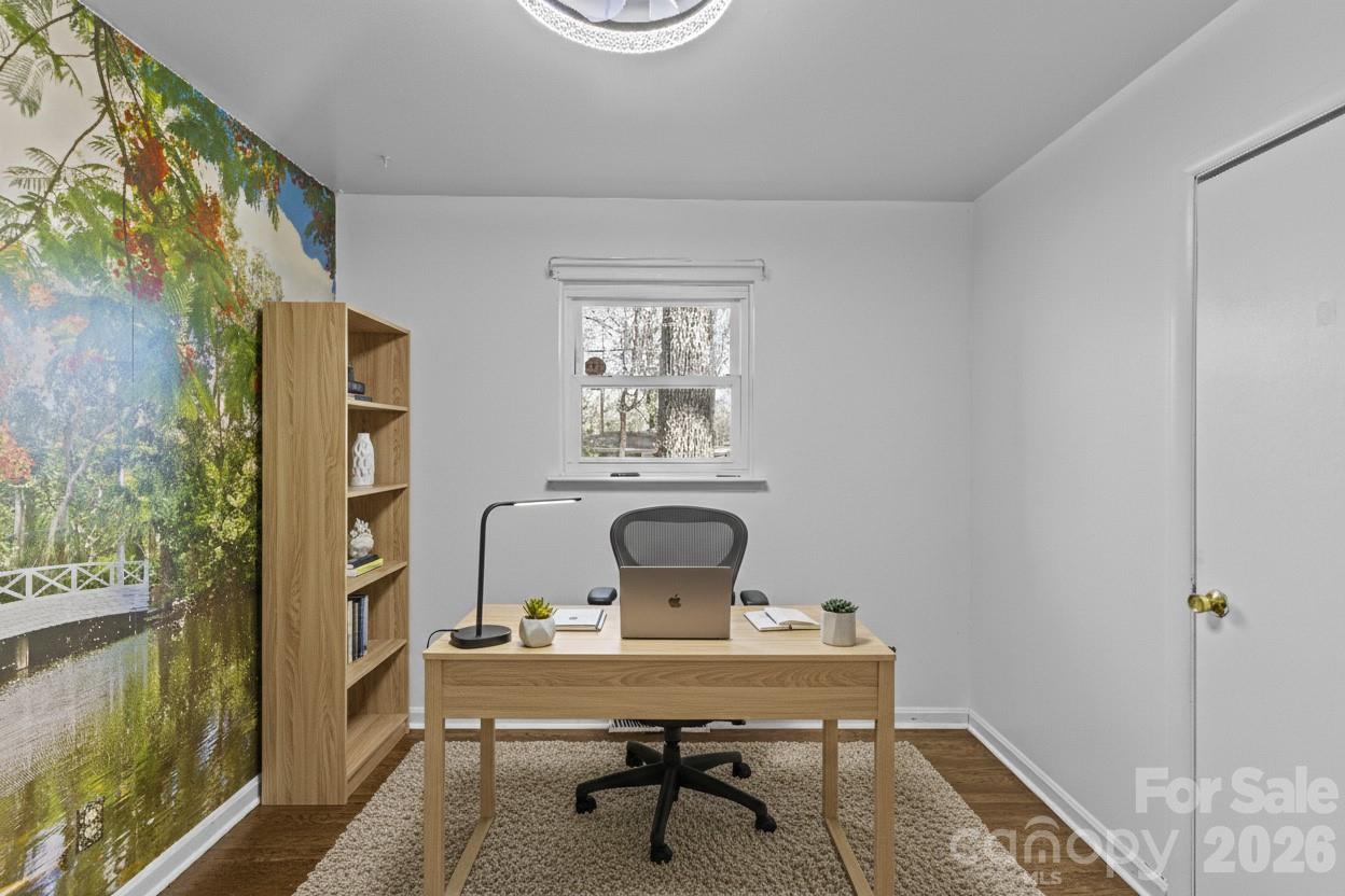 117 Robinson Avenue Matthews, NC 28104 - Photo 21 of 42 a view of a workspace with furniture and a window