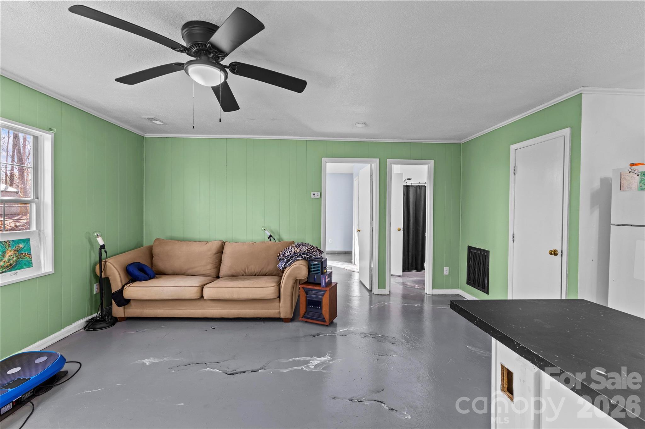 117 Robinson Avenue Matthews, NC 28104 - Photo 31 of 42 a living room with furniture and a wooden floor