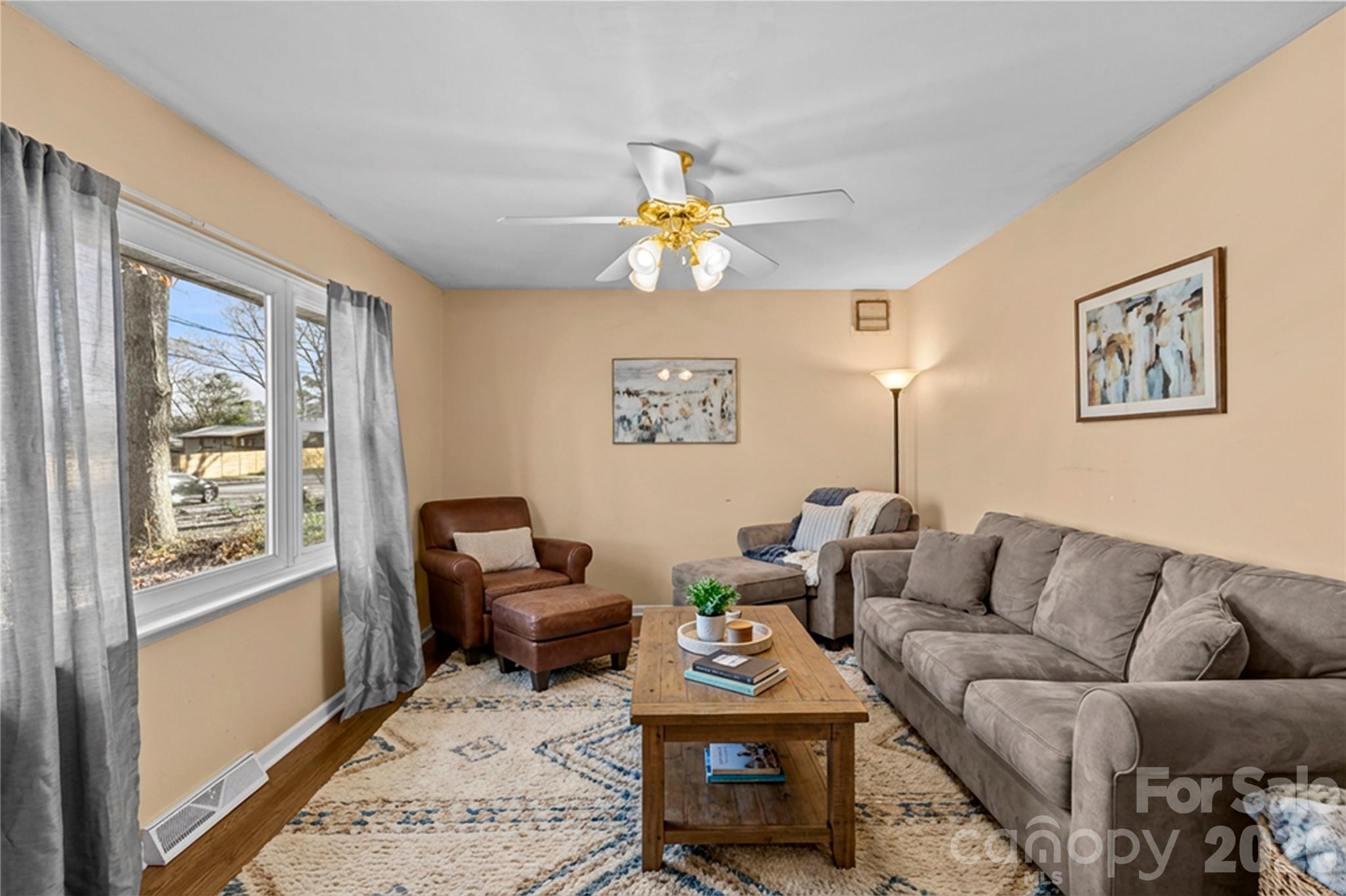 117 Robinson Avenue Matthews, NC 28104 - Photo 5 of 42 a living room with furniture and a window