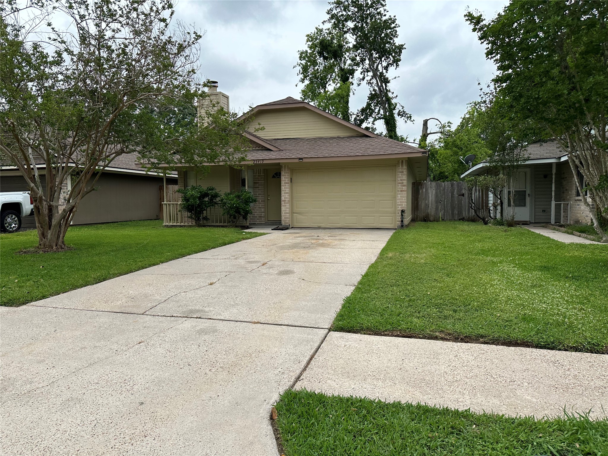 a front view of a house with yard