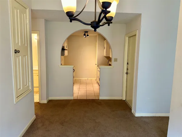 an entryway in front view of a house