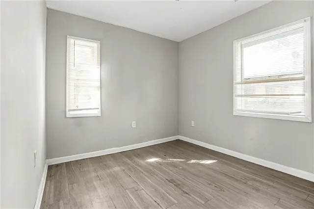a kitchen with a refrigerator and cabinets