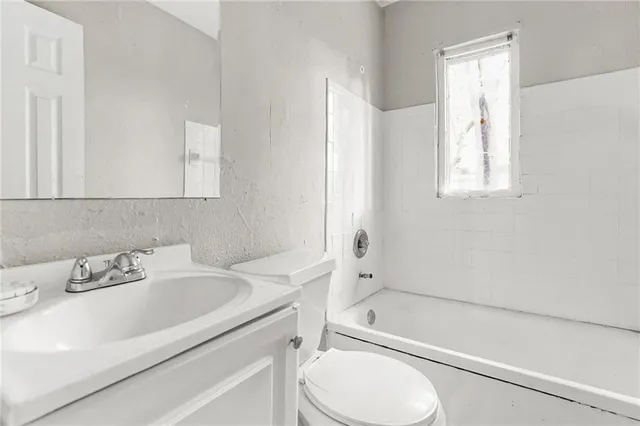 a view of a backyard with a sitting area