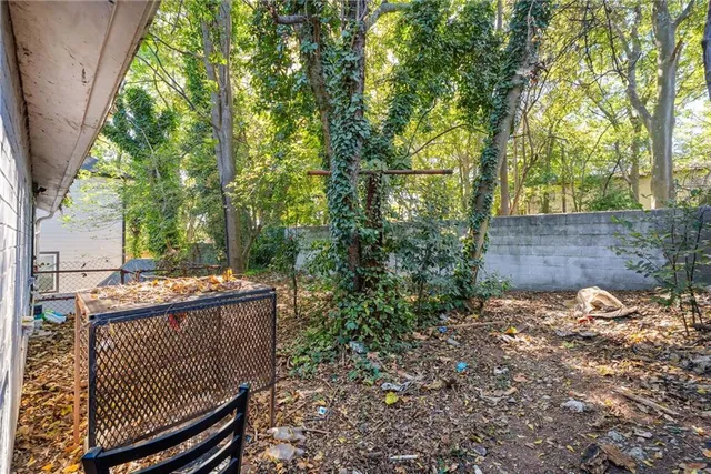 front view of a house with a bench