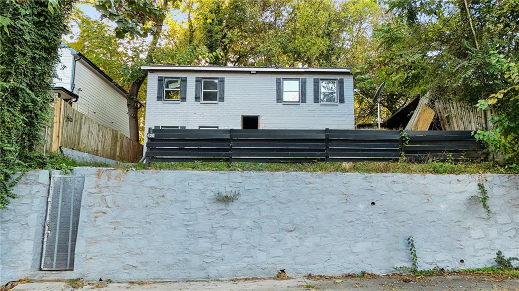 420 Griffin Street Northwest Atlanta, GA 30318 - Photo 5 of 40 a view of a house with a yard
