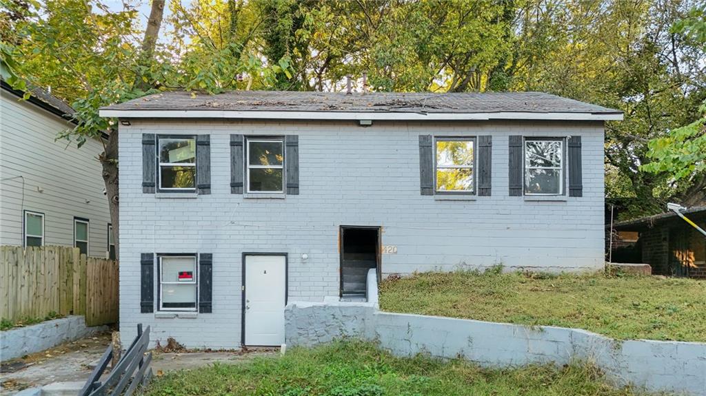 420 Griffin Street Northwest Atlanta, GA 30318 - Photo 6 of 40 a front view of a house with garden