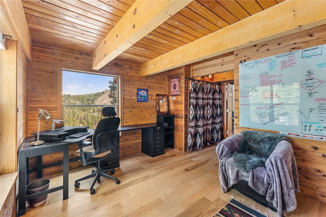 20102 Hibbet Trail Reno, NV 89511 - Photo 21 of 34 a livingroom with workspace and a window
