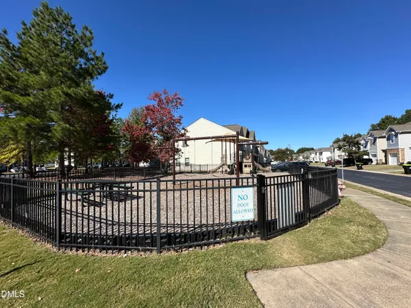 a view of a wrought iron fences in front of house