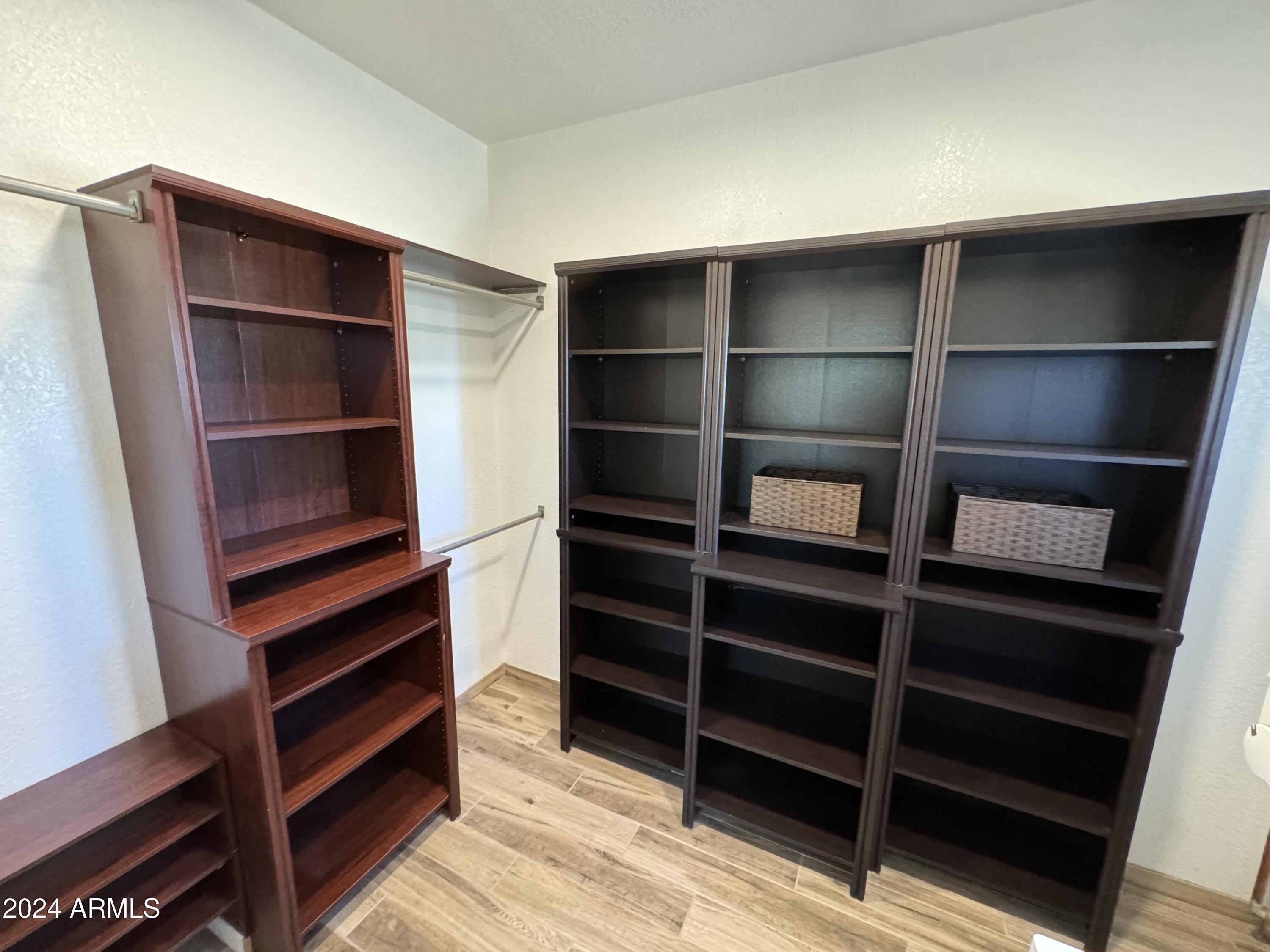 34470 North Sossaman Road San Tan Valley, AZ 85144 - Photo 9 of 12 a view of walk in closet with empty racks