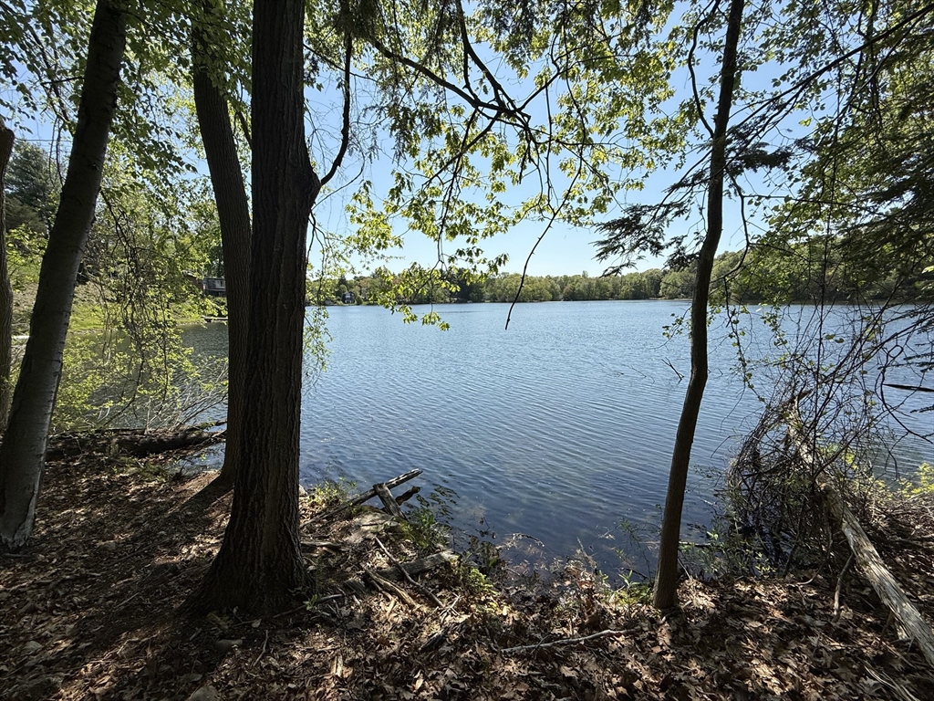 108 Dudley Road Wayland, MA 01778 - Photo 10 of 18 a view of a lake from a yard
