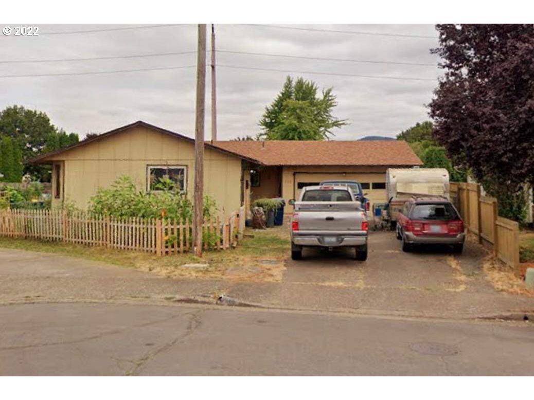 300 S Street Springfield, OR 97477 - Photo 1 of 26 a car parked in front of a house