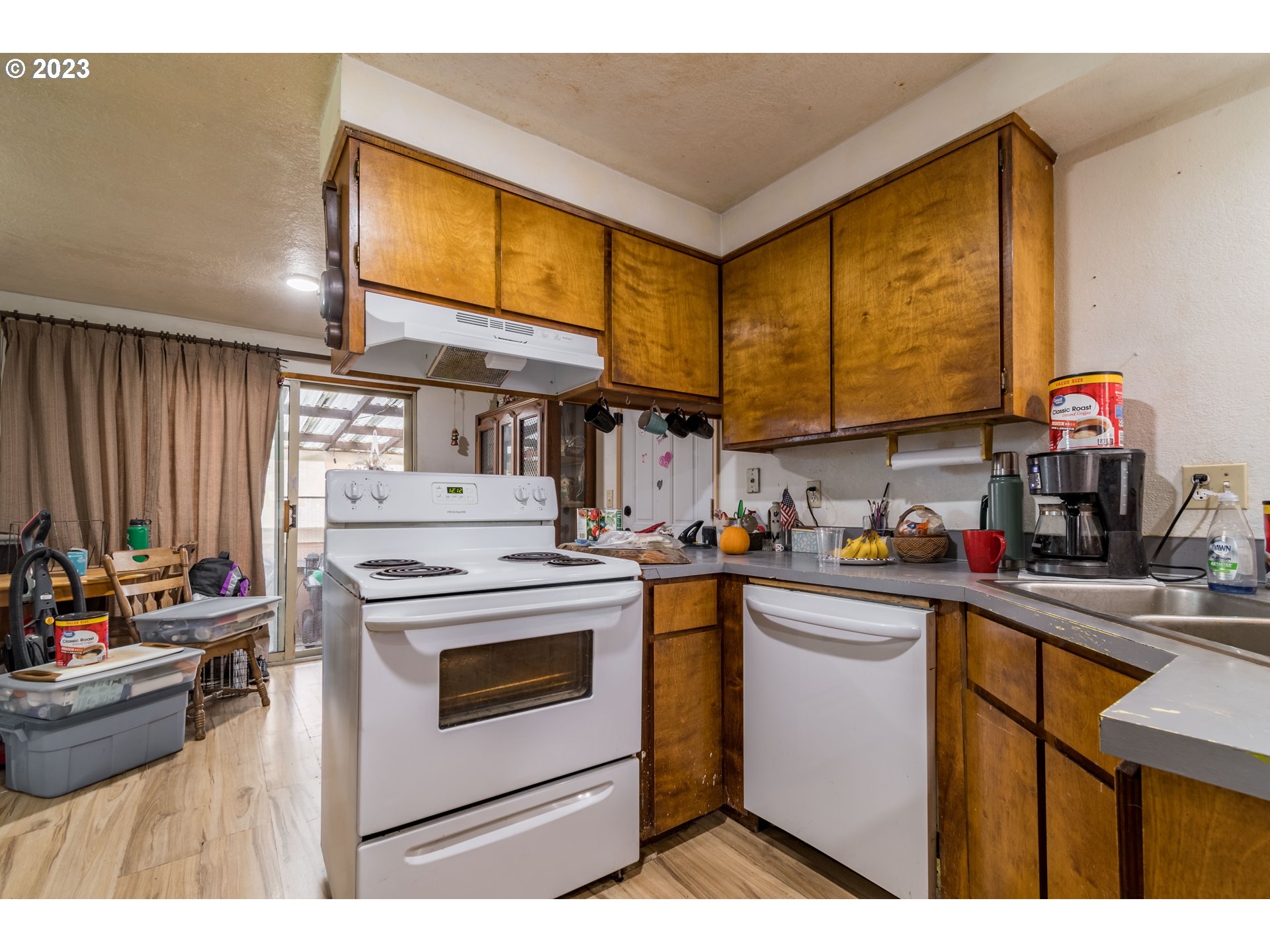300 S Street Springfield, OR 97477 - Photo 7 of 26 a kitchen that has a sink and a stove