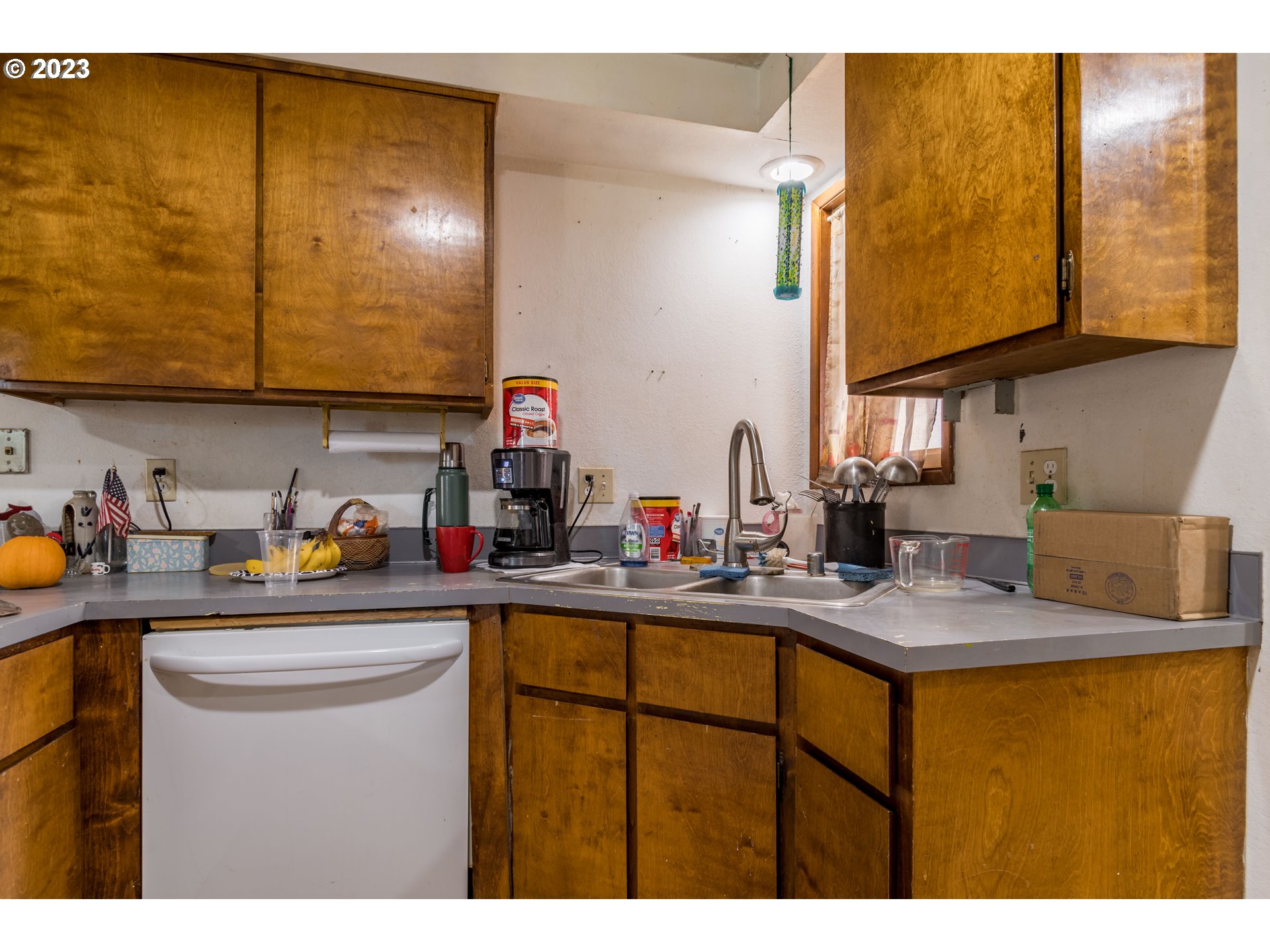 300 S Street Springfield, OR 97477 - Photo 8 of 26 a kitchen with sink and cabinets
