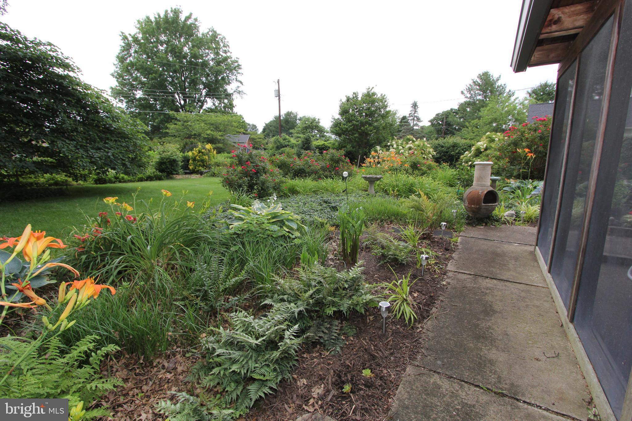 7930 Edgewood Farm Road Frederick, MD 21702 - Photo 38 of 53 Gardens adjacent the screened porch