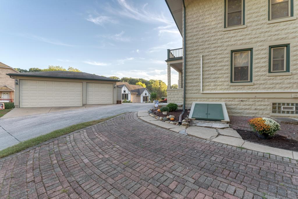 8611 Archer Avenue Willow Springs, IL 60480 - Photo 33 of 37 a backyard of a house with outdoor seating