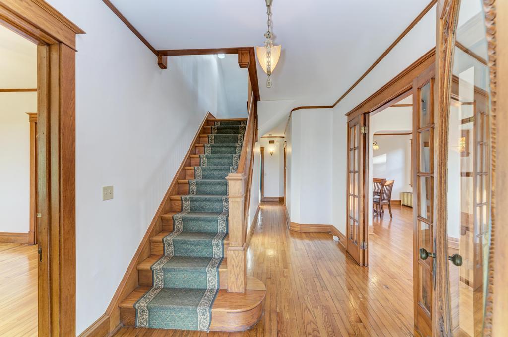 8611 Archer Avenue Willow Springs, IL 60480 - Photo 5 of 37 a view of entryway and hall with wooden floor