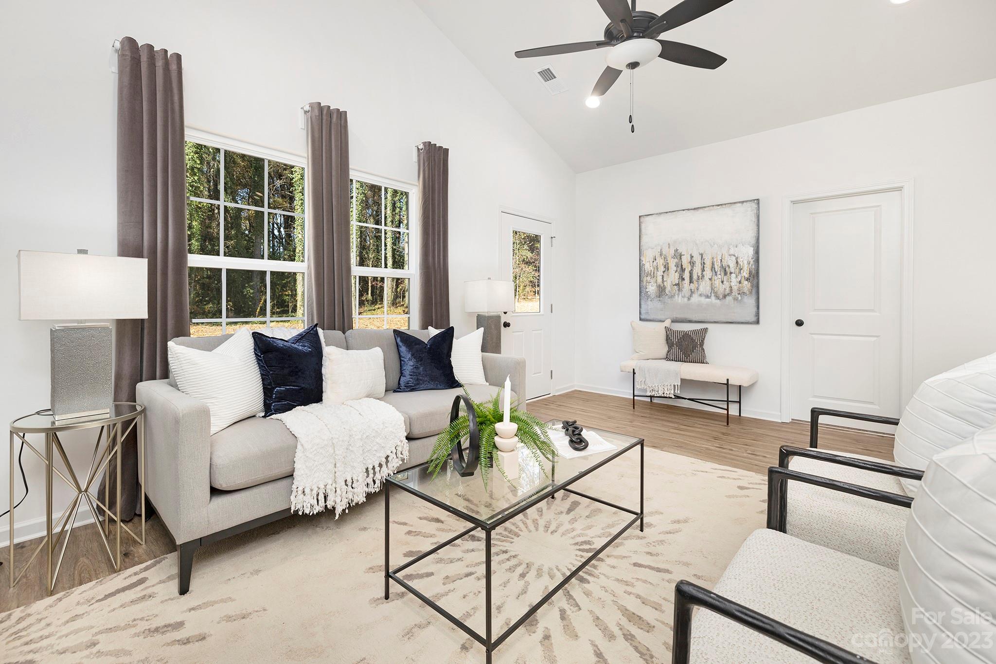 841 McDonald Road Charlotte, NC 28214 - Photo 2 of 16 a living room with furniture and a large window