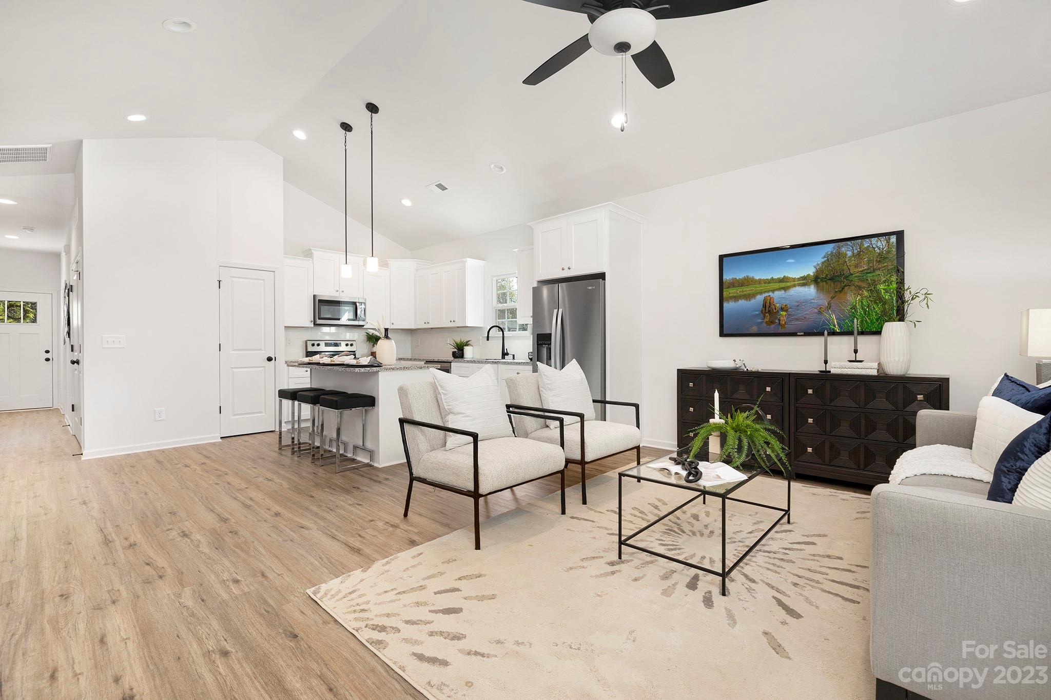 841 McDonald Road Charlotte, NC 28214 - Photo 3 of 16 a living room with furniture and a flat screen tv