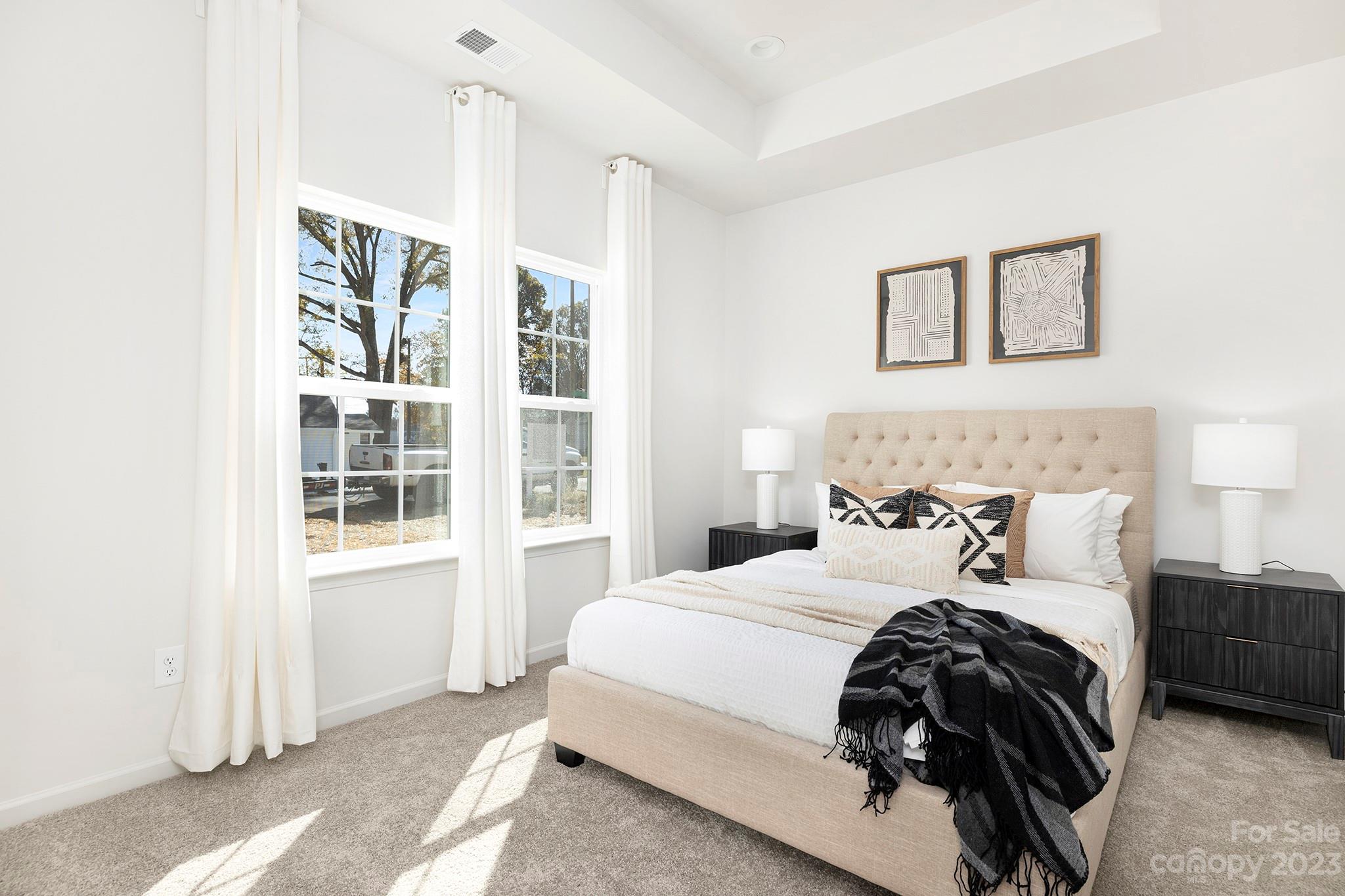 841 McDonald Road Charlotte, NC 28214 - Photo 8 of 16 a bedroom with a bed and a window