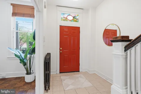 view of entryway with wooden floor