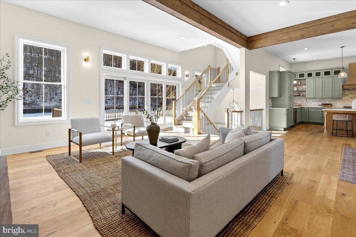 159 Byram Lane Stockton, NJ 08559 - Photo 14 of 62 a living room with furniture and a table