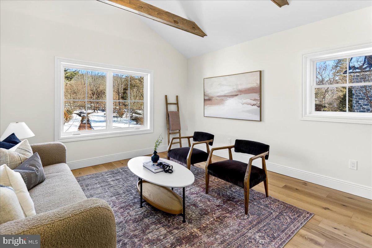 159 Byram Lane Stockton, NJ 08559 - Photo 30 of 62 a living room with furniture and a window with wooden floor