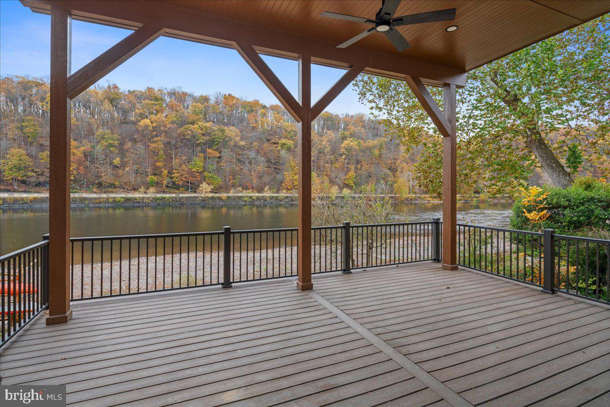 159 Byram Lane Stockton, NJ 08559 - Photo 3 of 62 a view of a balcony with wooden floor