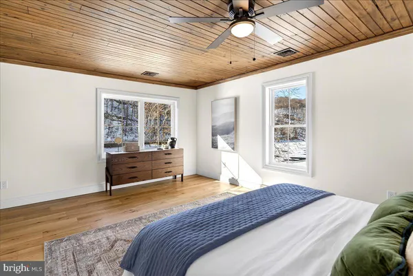 a picture of a book and a bed