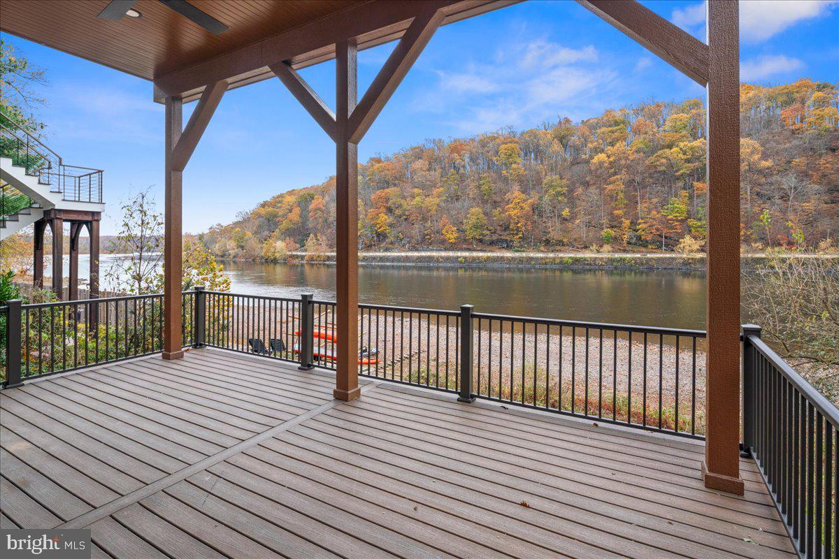 159 Byram Lane Stockton, NJ 08559 - Photo 50 of 62 a view of a balcony with wooden floor