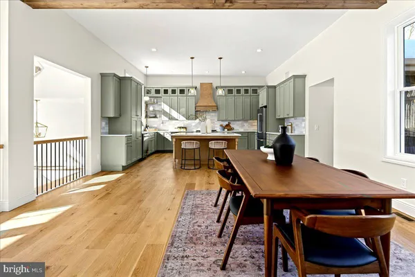 a balcony view with a seating space