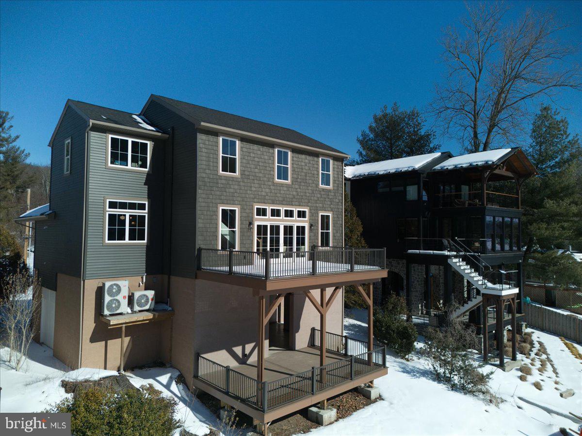 159 Byram Lane Stockton, NJ 08559 - Photo 53 of 62 a view of a house with backyard and sitting area