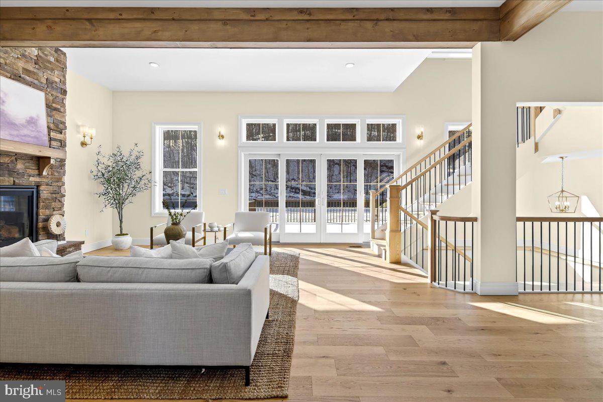 159 Byram Lane Stockton, NJ 08559 - Photo 9 of 62 a living room with furniture and a fireplace