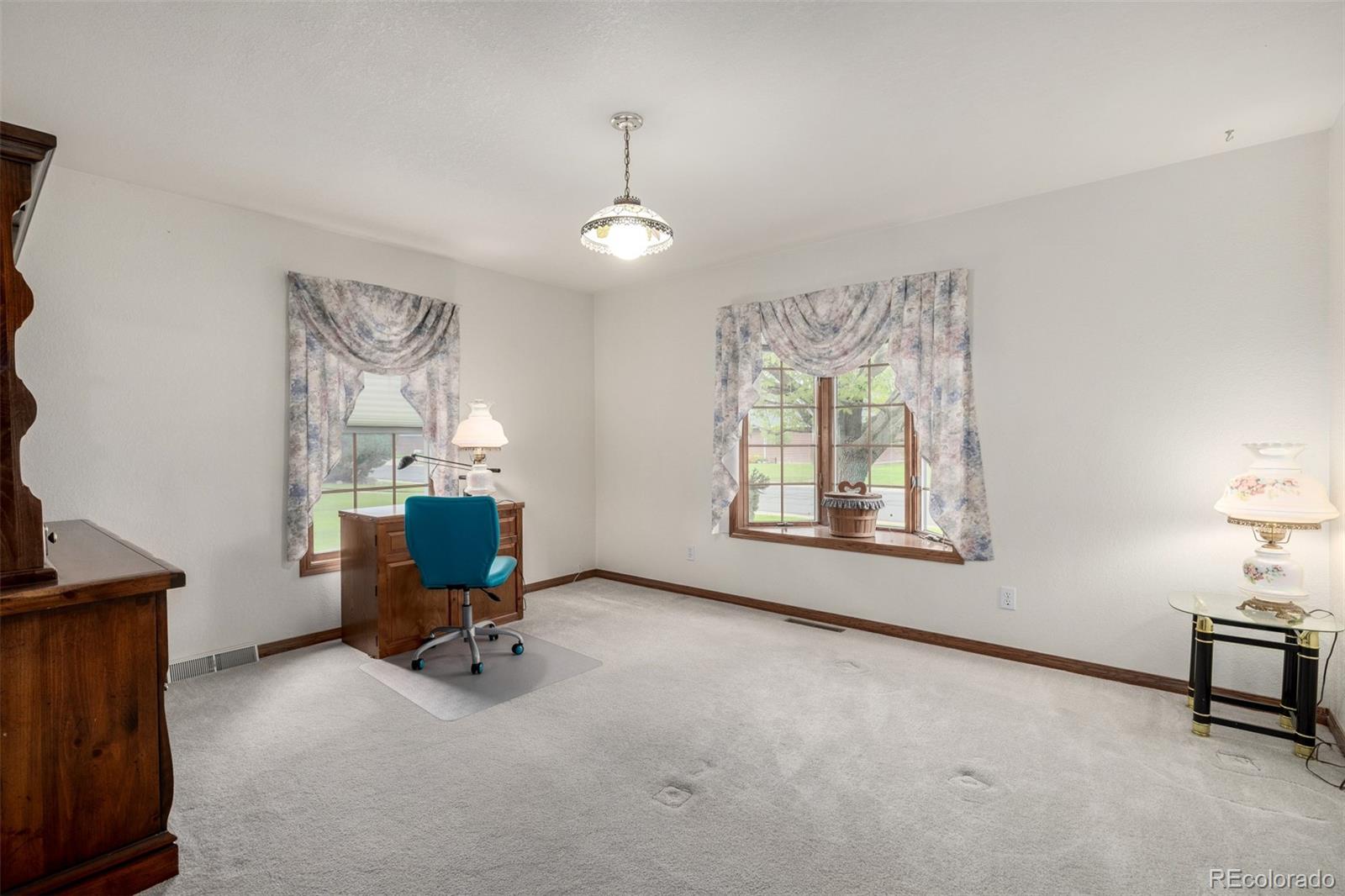 909 Fairhurst Street Sterling, CO 80751 - Photo 32 of 50 a view of workspace with windows