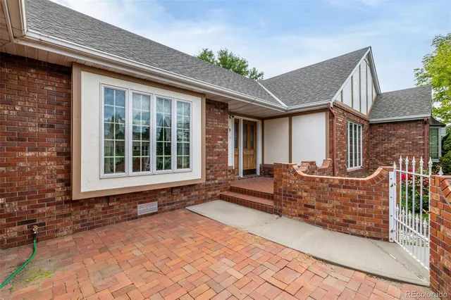 a view of house with outdoor space and porch