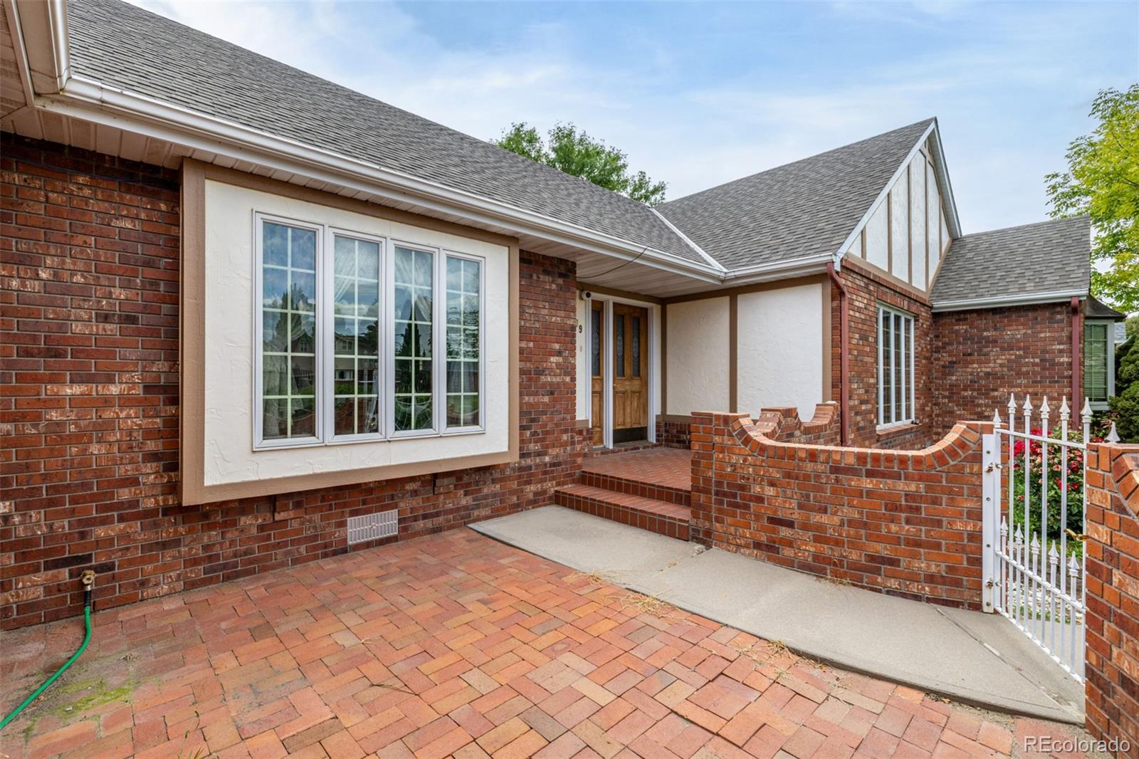 909 Fairhurst Street Sterling, CO 80751 - Photo 9 of 50 a view of house with outdoor space and porch