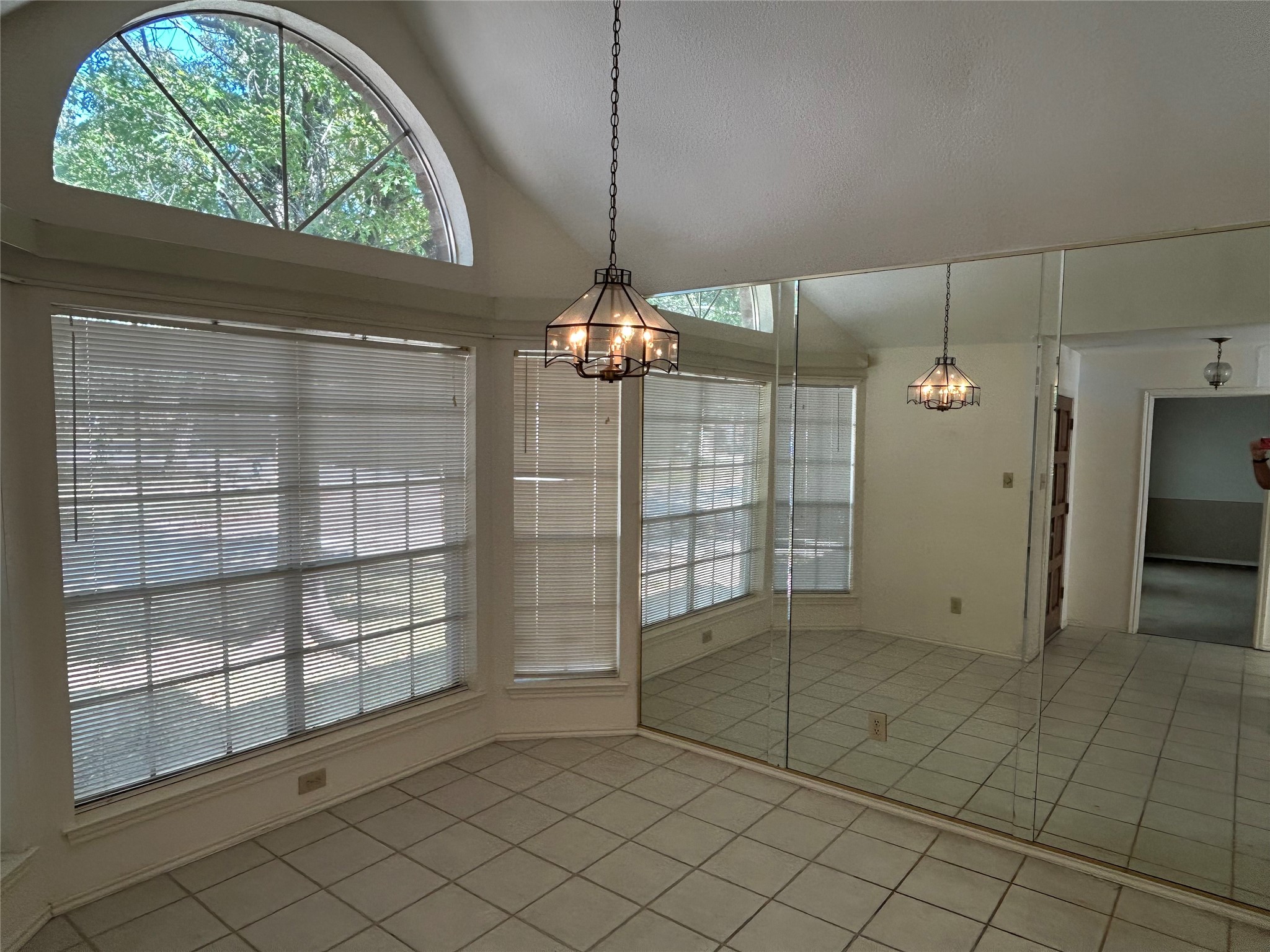 5338 Rivergate Drive Spring, TX 77373 - Photo 5 of 14 an empty room with a fireplace and large window