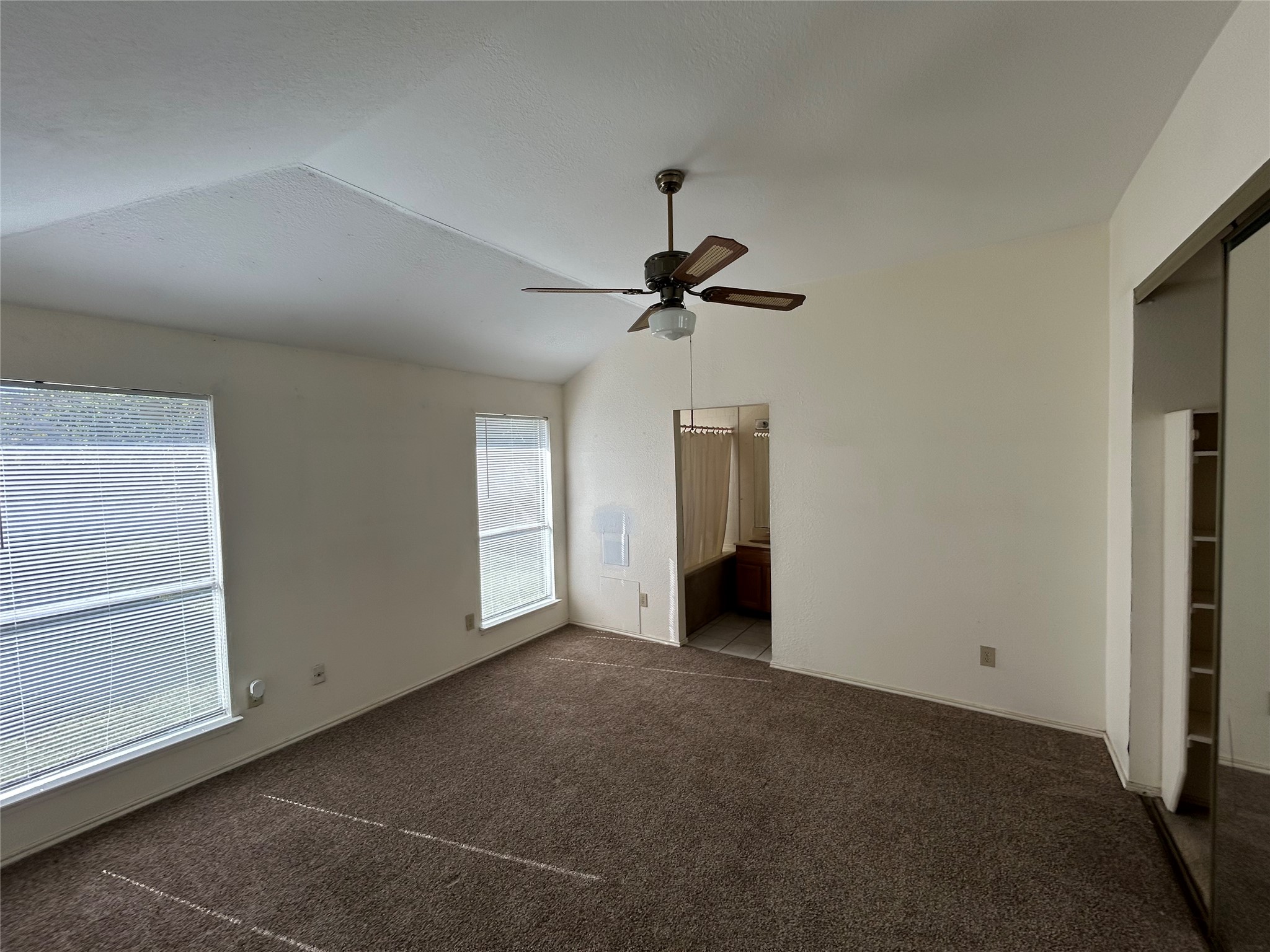 5338 Rivergate Drive Spring, TX 77373 - Photo 6 of 14 a view of a livingroom with a ceiling fan and window