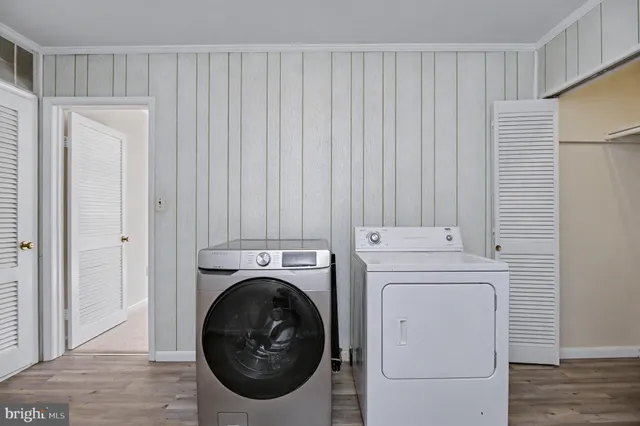 a utility room with dryer and washer