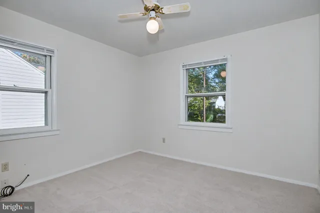 a bathroom with a sink a toilet and bathtub