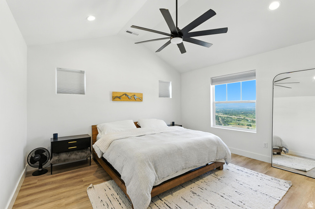 6039 North Westridge Road Heber City, UT 84032 - Photo 15 of 22 Bedroom featuring vaulted ceilings with recessed lighting, a ceiling fan, and wood-finish flooring
