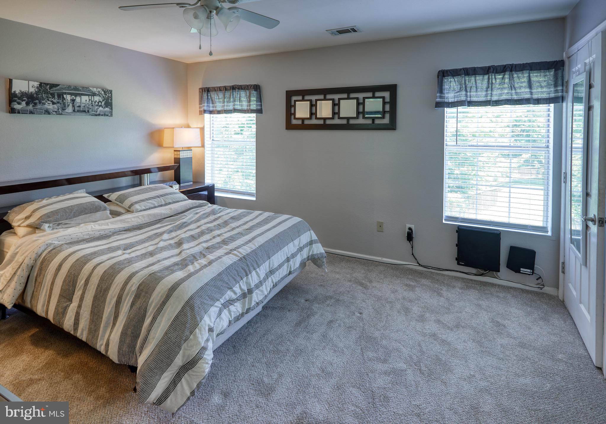 302 Canterbury Road, Unit F Bel Air, MD 21014 - Photo 11 of 26 a bedroom with a bed and a window
