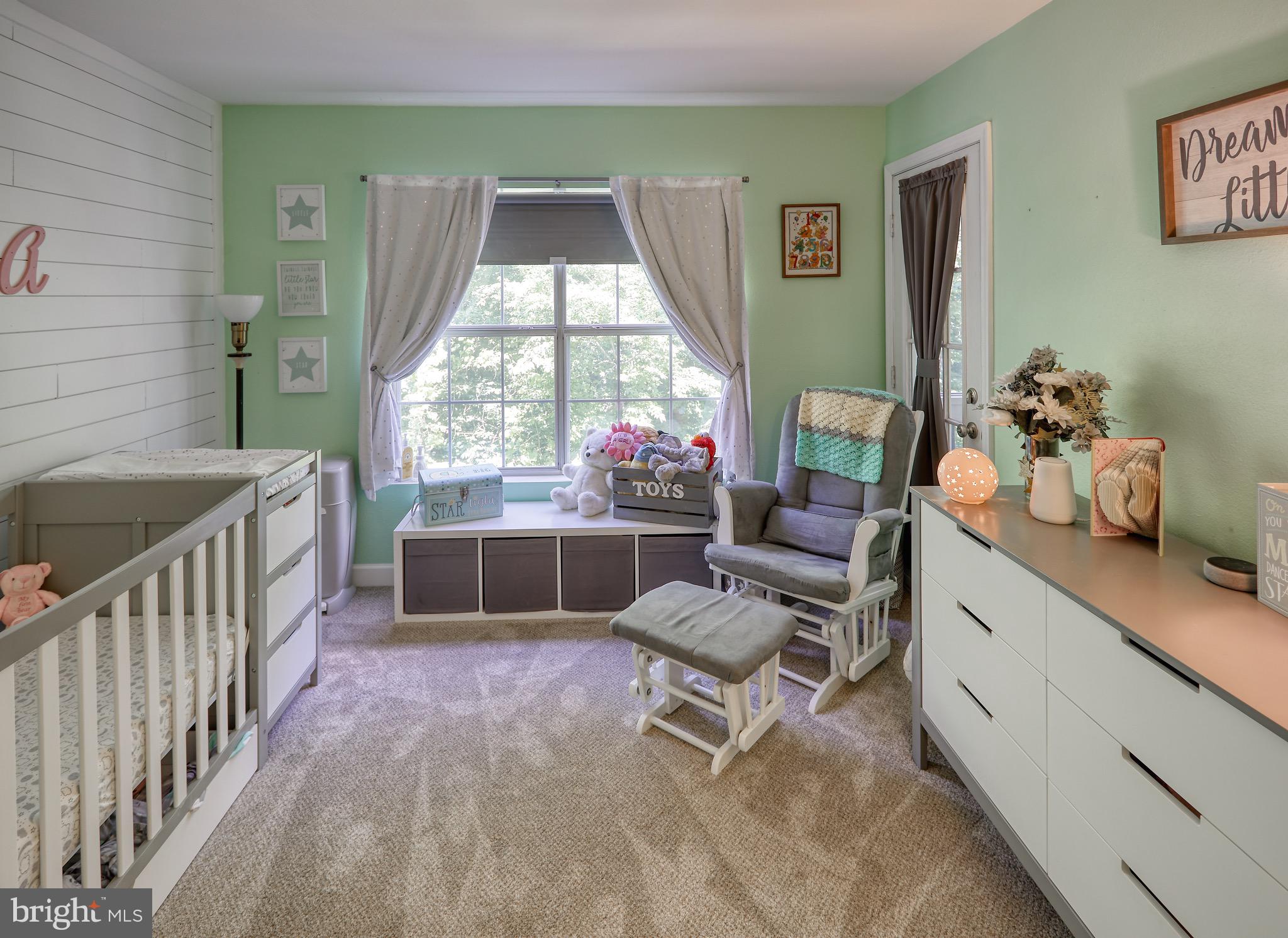 302 Canterbury Road, Unit F Bel Air, MD 21014 - Photo 15 of 26 a living room with furniture and a large window