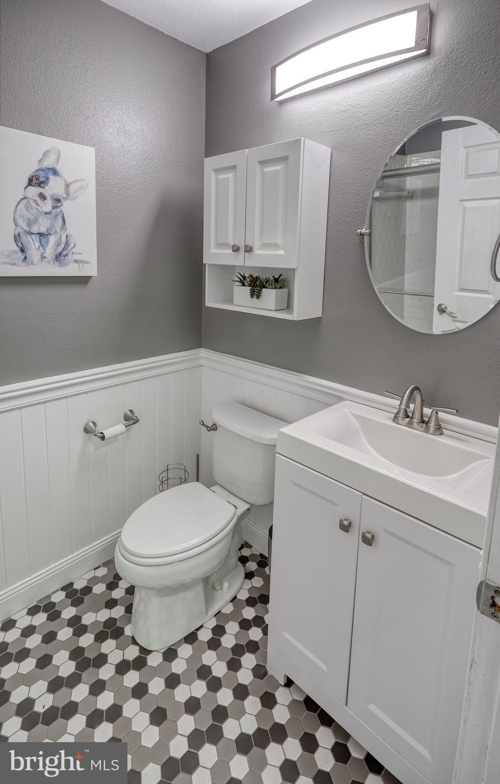 302 Canterbury Road, Unit F Bel Air, MD 21014 - Photo 16 of 26 a bathroom with a sink toilet and shower