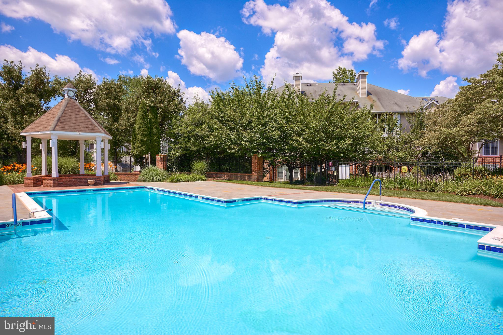 302 Canterbury Road, Unit F Bel Air, MD 21014 - Photo 25 of 26 a view of an house with swimming pool and yard