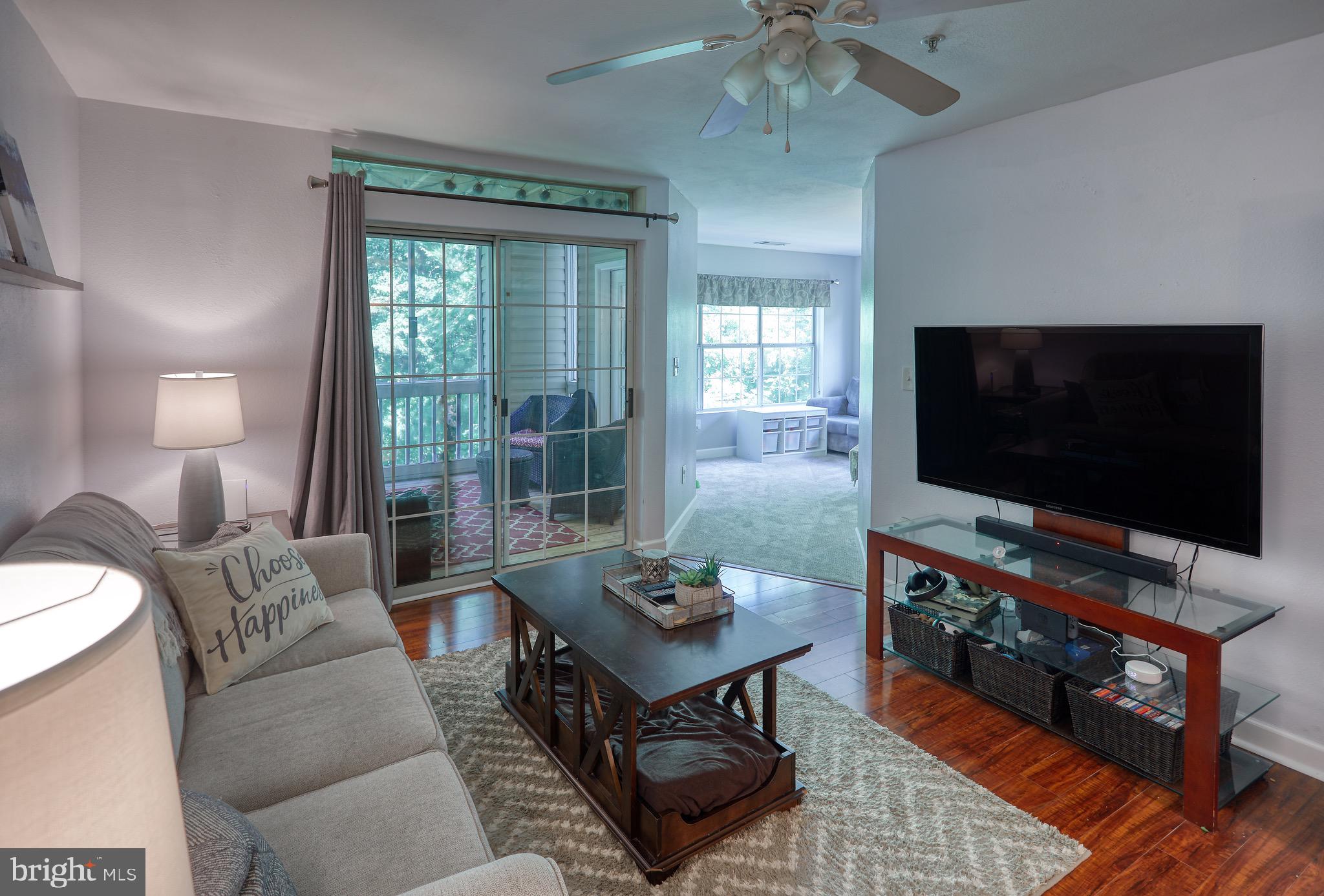 302 Canterbury Road, Unit F Bel Air, MD 21014 - Photo 8 of 26 a living room with furniture and a flat screen tv